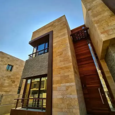 Ready to move standalone villa 6 bedrooms for sale in Taj City Cairo Suez Road